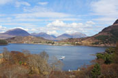 Loch Sheildaig and the village of Sheildaig with the Torridon Mountain Range in the background, Wester Ross, Scotland