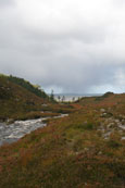 The Inverianvie River with a rainstorm brewing over Gruinard Island, Wester Ross, Scotland